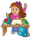 Girl behind school desk theme image 1 Royalty Free Stock Photo