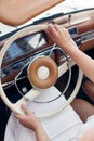 The girl behind the wheel of a beautiful retro car Royalty Free Stock Photo