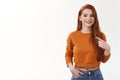 Girl believe herself proving she worth job right candidature. Carefree relaxed pleasant smiling urban attractive redhead