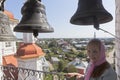 Girl on the bell tower of the Church of the Entry of the Lord into Jerusalem in Totma