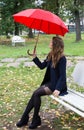 Girl on a bench in the city park