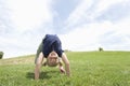 Girl Bending Over Backwards On Grass Royalty Free Stock Photo