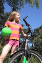 Girl with bicycle Royalty Free Stock Photo