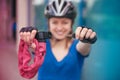 Girl with bicycle lock. Bicycle lock near the bike. Cycling park Royalty Free Stock Photo