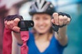 Girl with bicycle lock. Bicycle lock near the bike. Cycling park Royalty Free Stock Photo