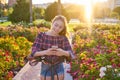 Girl bicycle playing with smartphone in park