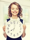 Girl with big clock Royalty Free Stock Photo