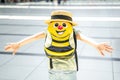 Girl with big funny backpack, bag in airport terminal. Waiting for boarding to flight. Happy family vacation travel Royalty Free Stock Photo