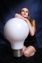Girl with the big lamp Royalty Free Stock Photo