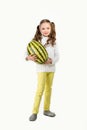 Girl with big toy watermelon on a white background. Royalty Free Stock Photo