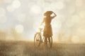 Girl on a bike in the countryside Royalty Free Stock Photo