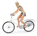 Girl in bikini on bicycle.