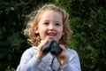 Girl with binoculars