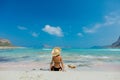 Girl in black bikini and with hat on Balos beach Royalty Free Stock Photo