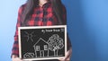 Girl with black board