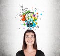 Girl in black and colorful light bulb Royalty Free Stock Photo