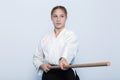 A girl in black hakama standing in fighting pose