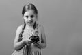 Girl with black retro clock, copy space. School girl Royalty Free Stock Photo