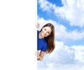 Girl with the blank banner. Perfect space to put any text. Royalty Free Stock Photo