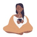 Girl in blanket drinking hot tea