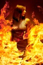 Girl is in blazing flame Royalty Free Stock Photo