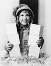 Girl with blocks spelling buy now Royalty Free Stock Photo