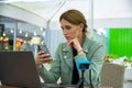 Girl blogger blogging in a cafe on a summer terrace outdoors Royalty Free Stock Photo