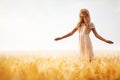 Girl with blond hair posing on wheat field Royalty Free Stock Photo