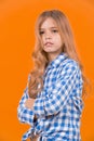 Girl with blond long hair in blue plaid shirt pose Royalty Free Stock Photo