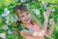 Girl in blooming apple tree garden Royalty Free Stock Photo