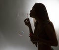 Girl blow bubbles Royalty Free Stock Photo