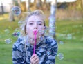 Girl blowin bubbles Royalty Free Stock Photo