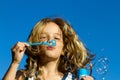 Girl blowing bubbles Royalty Free Stock Photo