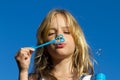 Girl blowing bubbles