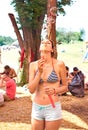 Girl blowing bubles on Ozora Festiva Royalty Free Stock Photo