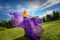 Girl in blowing dress Outdoors Royalty Free Stock Photo