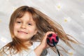 Girl blowing dry her hair Royalty Free Stock Photo