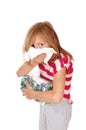 Girl blowing her nose. Royalty Free Stock Photo