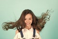 Girl with blowing long healthy brunette hair Royalty Free Stock Photo