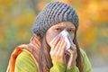 Girl blowing nose Royalty Free Stock Photo