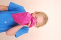 Girl blowing pink paper bag Royalty Free Stock Photo