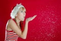 Girl blowing snow Royalty Free Stock Photo