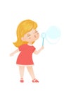 Girl blowing a soap bubble. Royalty Free Stock Photo