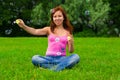 Girl blowing soap bubbles