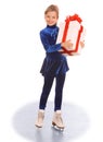Girl in blue dress on skates. Royalty Free Stock Photo