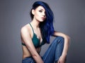 Girl with Blue hair. woman in jeans and underwear Royalty Free Stock Photo