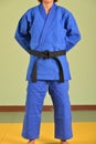 A girl in blue judo gi.