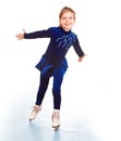 Girl in blue sport dress on skates.