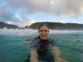 Girl bodysurfing in hawaii Royalty Free Stock Photo