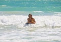 Girl boogie boarding the waves Royalty Free Stock Photo